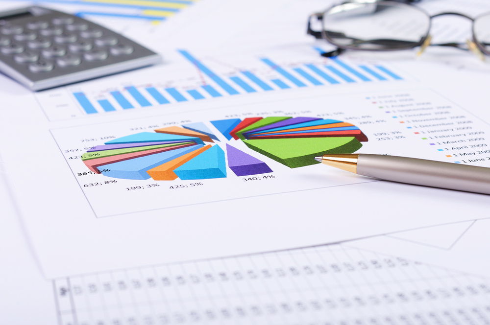 charts and graphs of sales of securities - workplace successful business man