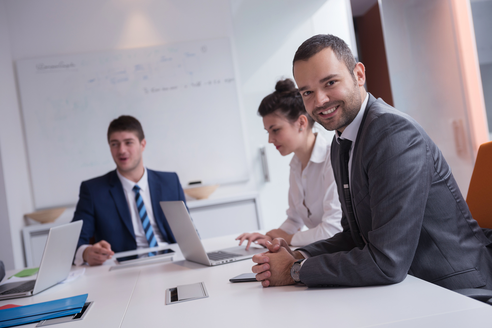 young business people group have meeting and working in modern bright office indoor